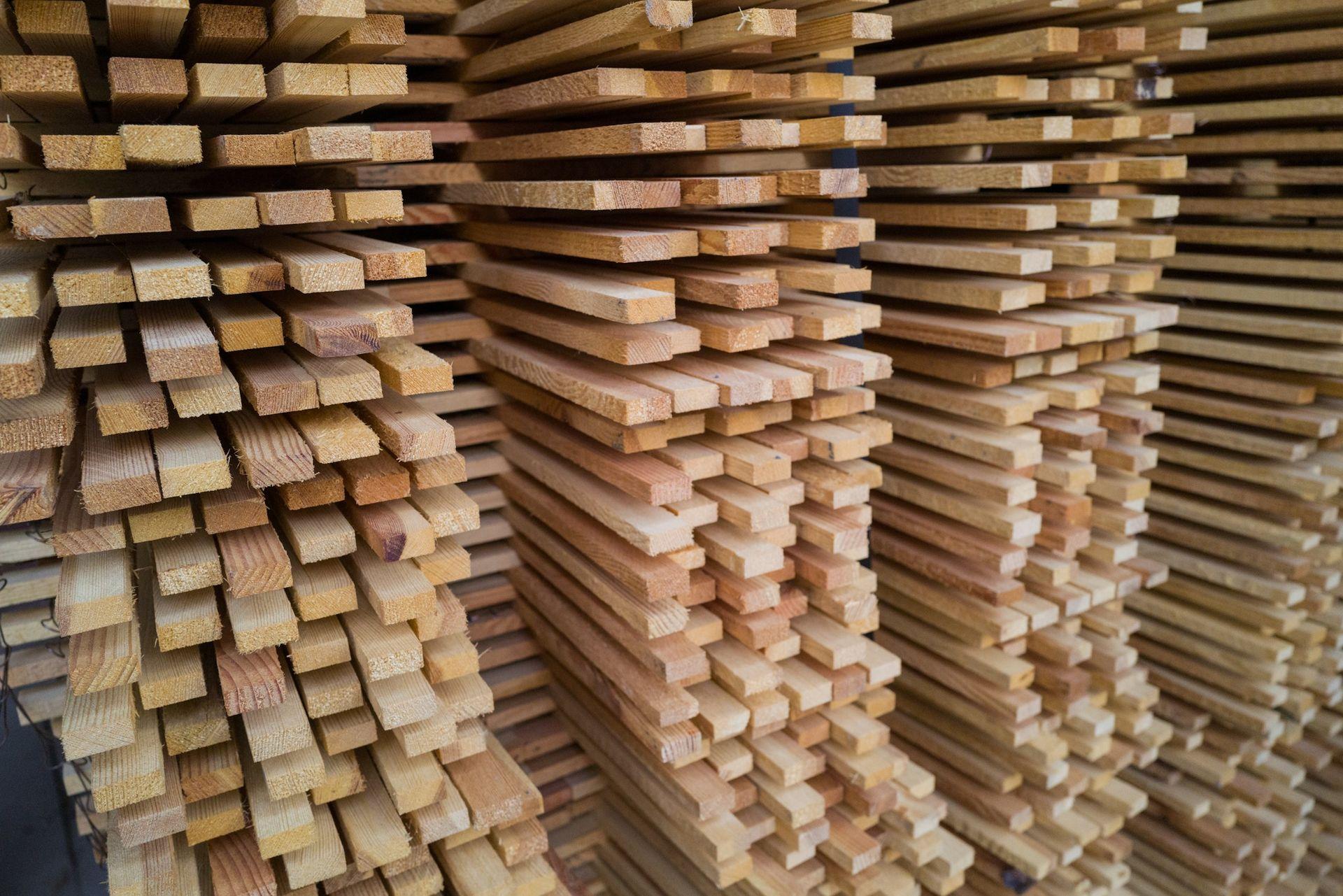 Stacked tropical hardwood timber ready for export